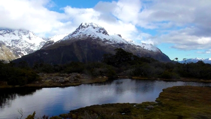 NEW ZEALAND: An alpine lake surrounded by mountains on the Routeburn Track.