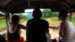 LAOS: There's no better way to travel, than with friends in a tuk tuk.